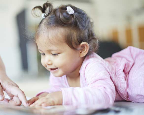 toddler girl reading